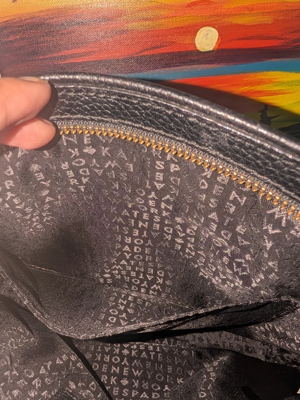 kate spade Black Pebbled Leather Crossbody with Tassel Zip Pocket